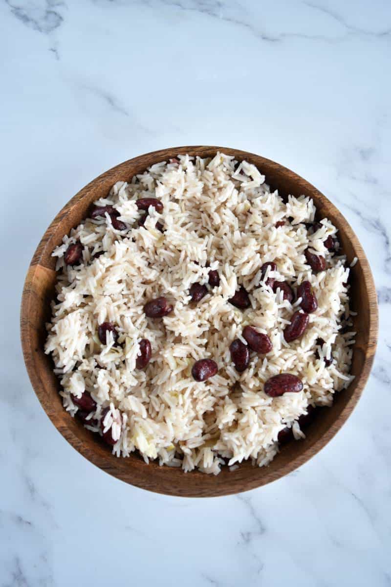 Red beans and coconut rice in a wooden bowl.