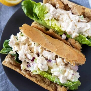 Southern chicken salad in a sandwich with lettuce.