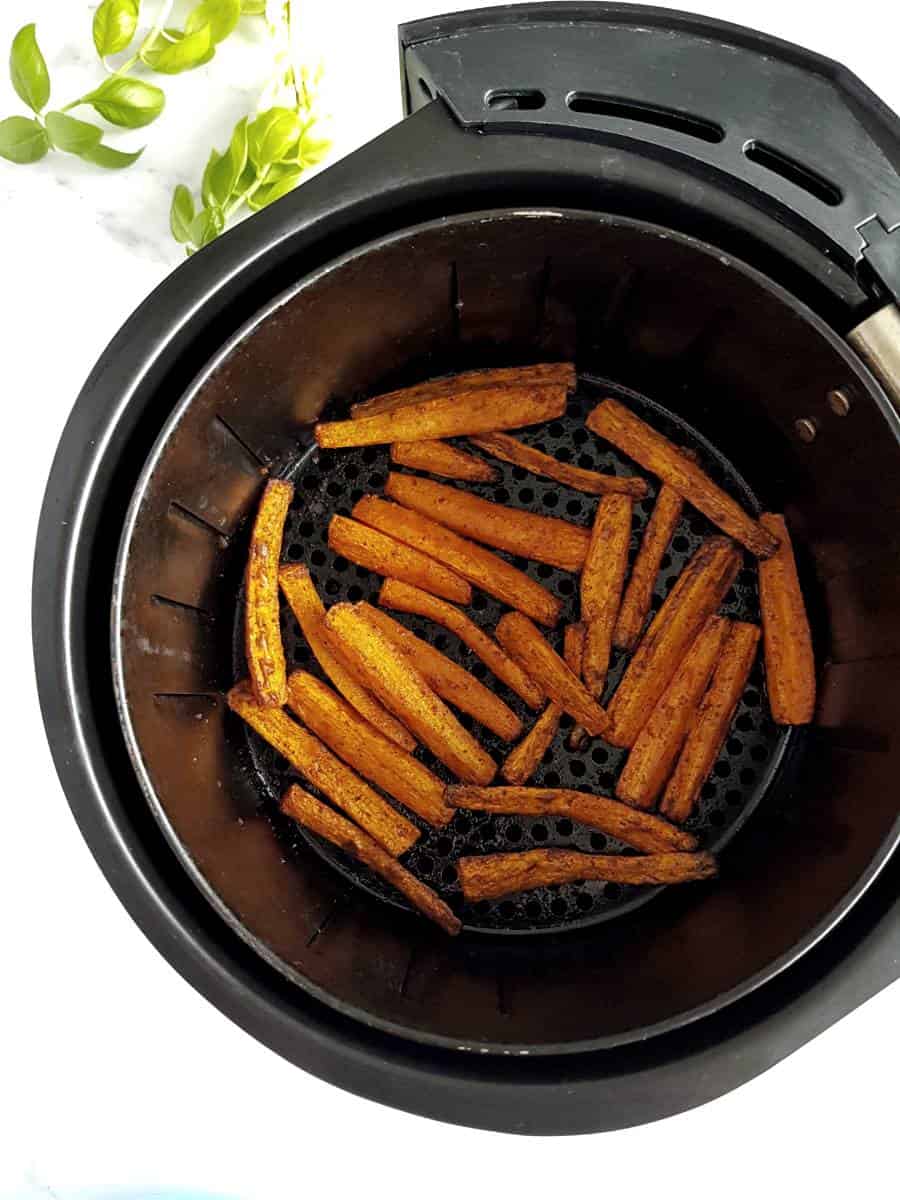 Carrots in an air fryer.