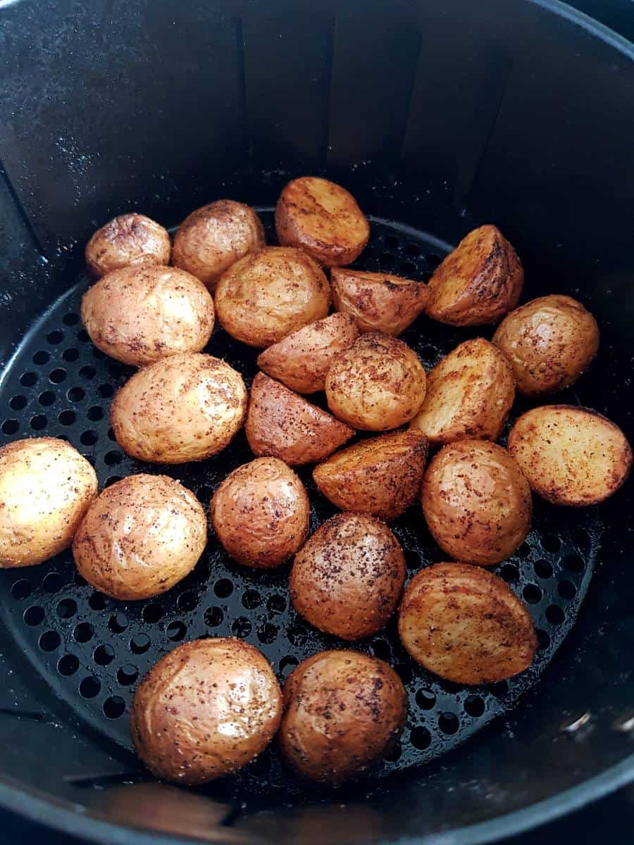 Potatoes in an air fryer.