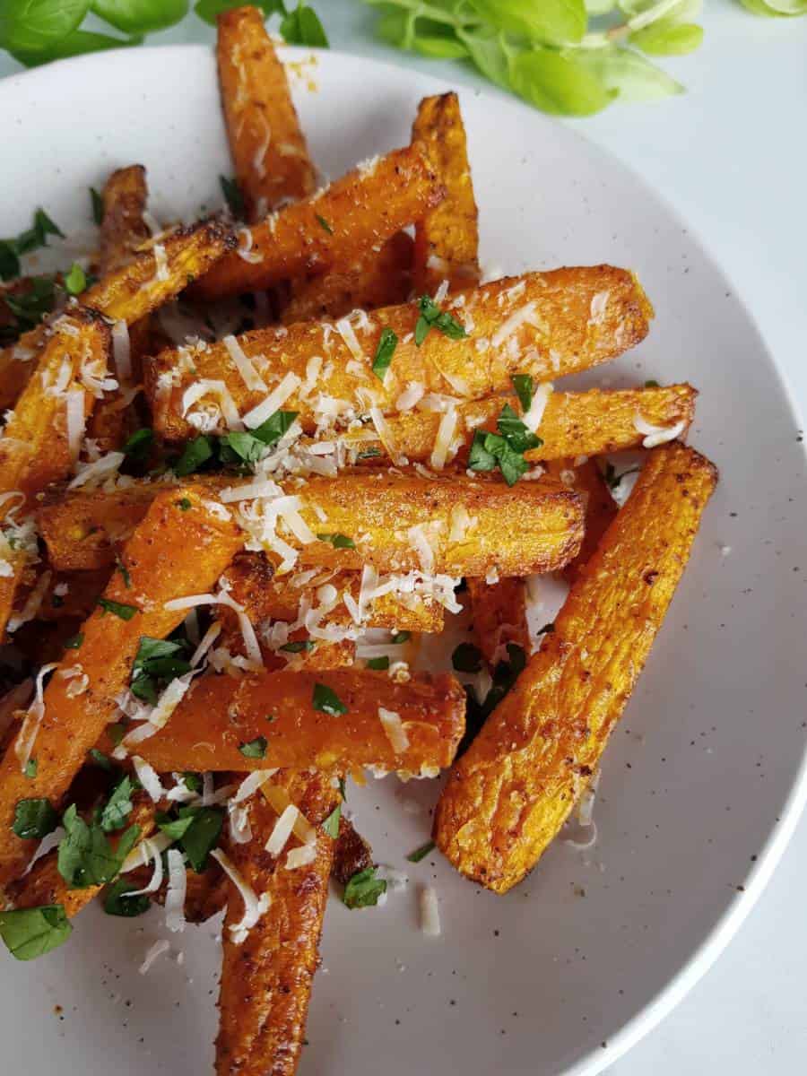 Air fryer roasted carrots on a plate.