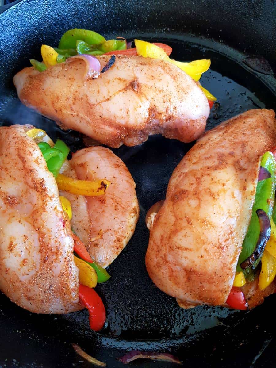 Chicken breasts with peppers.