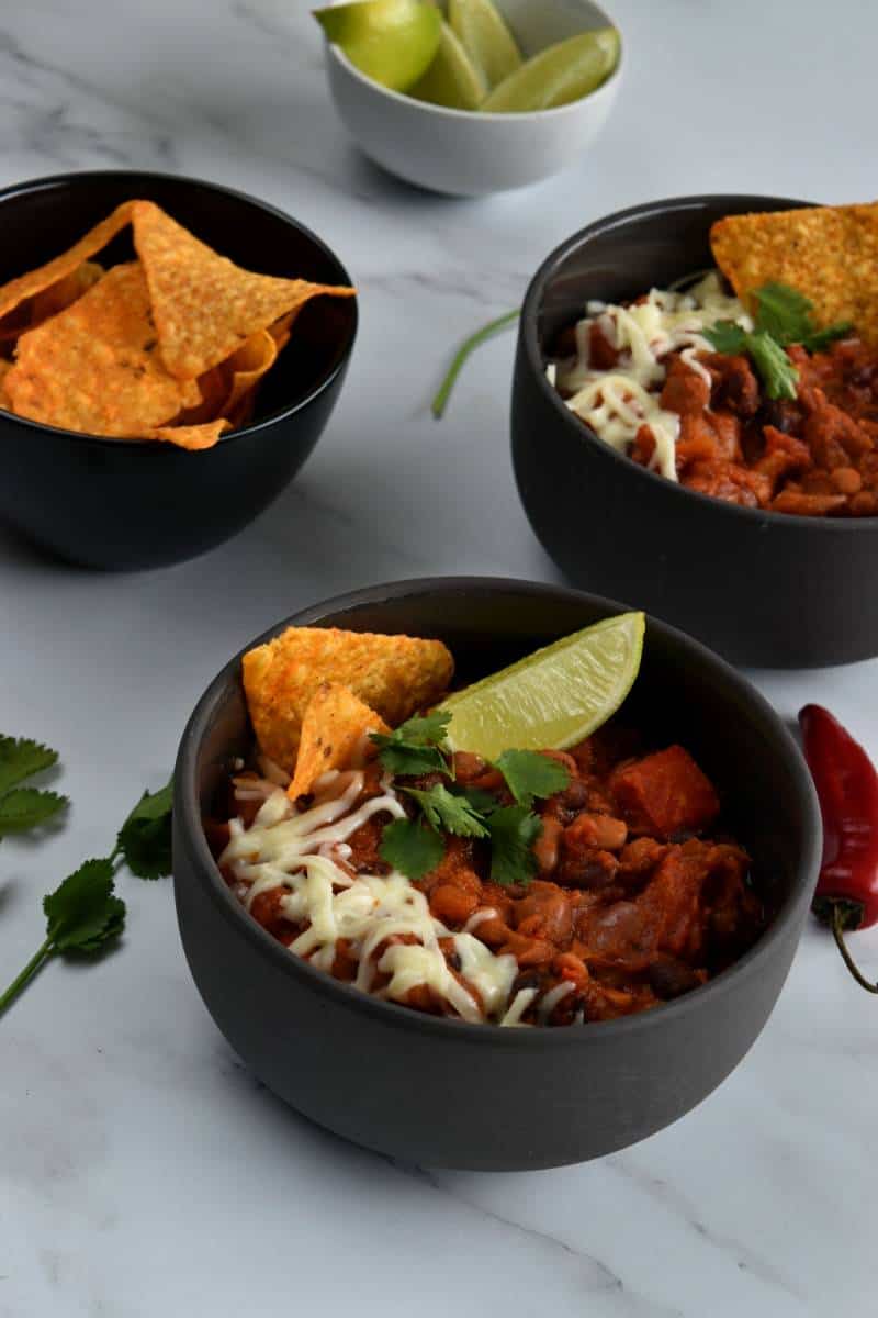 Chilli with beans in bowls.