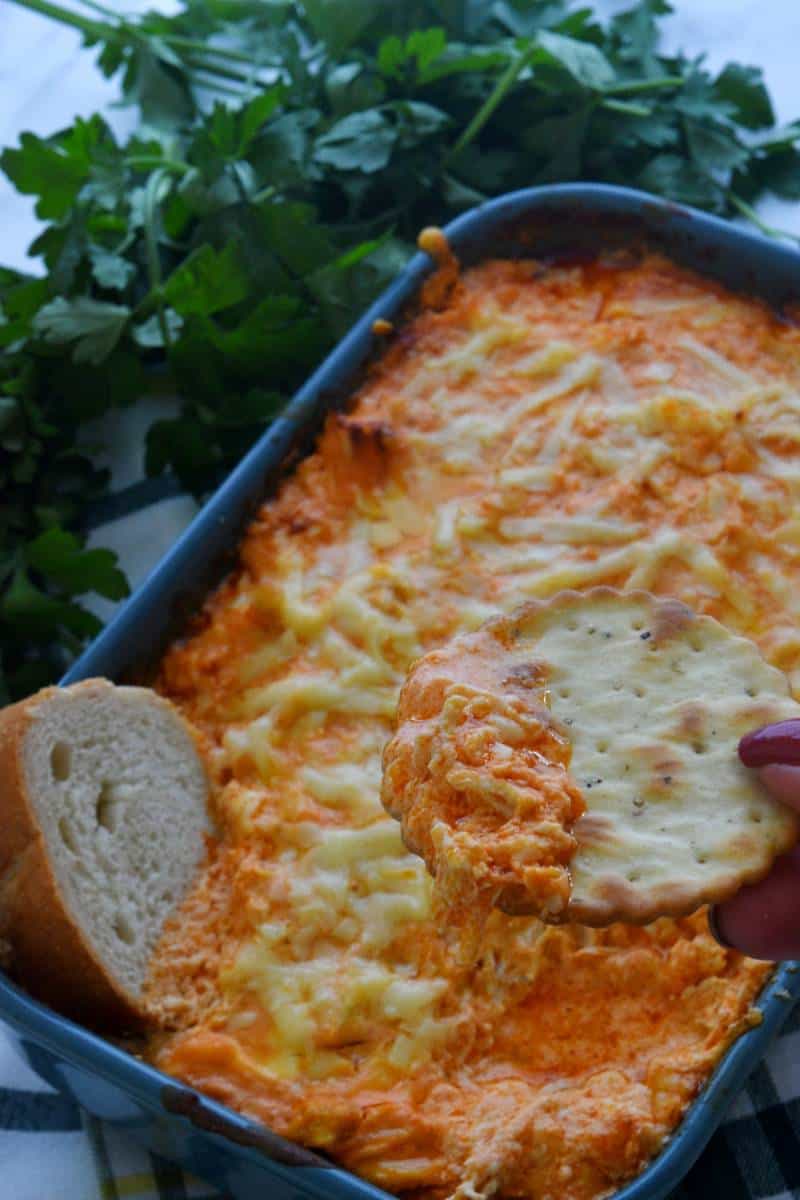 Healthy buffalo chicken dip in a baking tray.