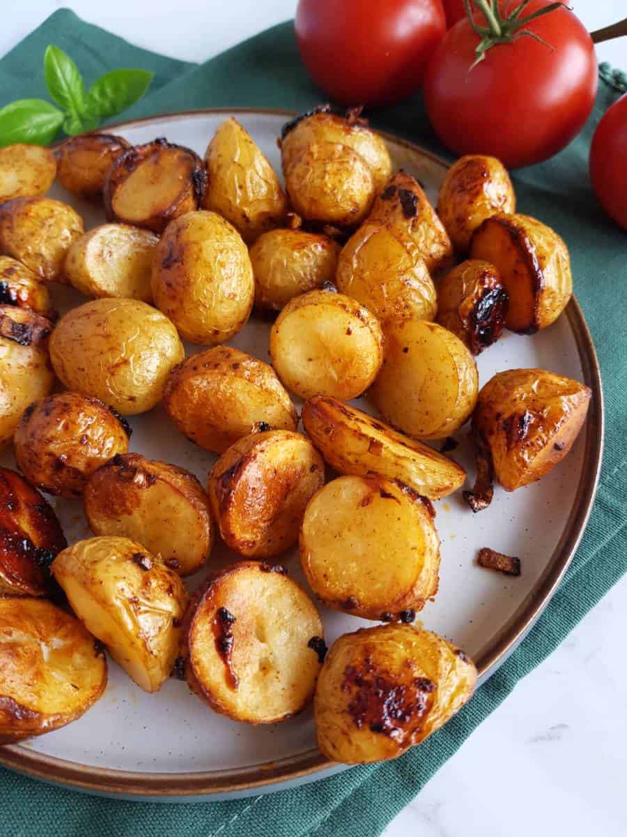 Honey glazed potatoes on a plate.