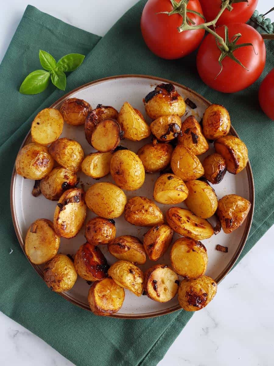 Honey roasted potatoes on a plate.