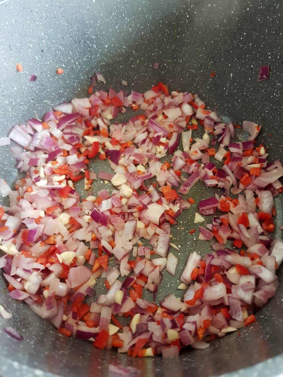 Onion, chili and garlic sauteeing.