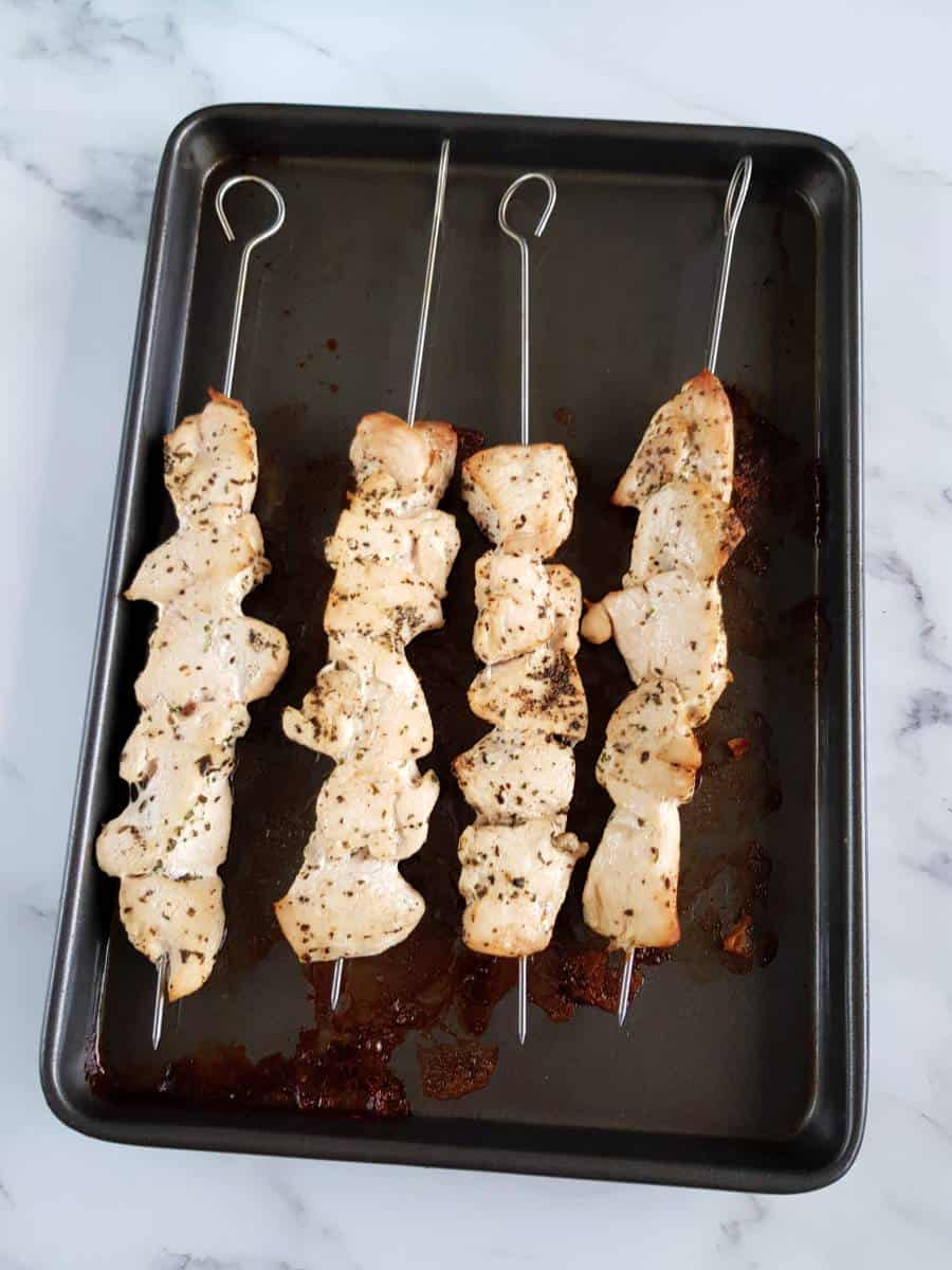 Oven baked chicken skewers.