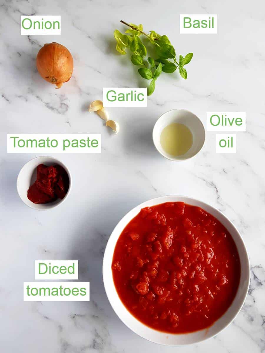 Spaghetti sauce ingredients on a table.