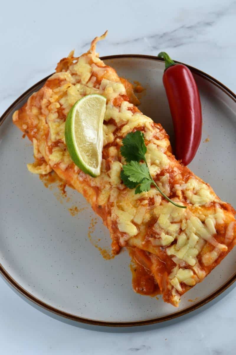 Turkey enchiladas on a plate.