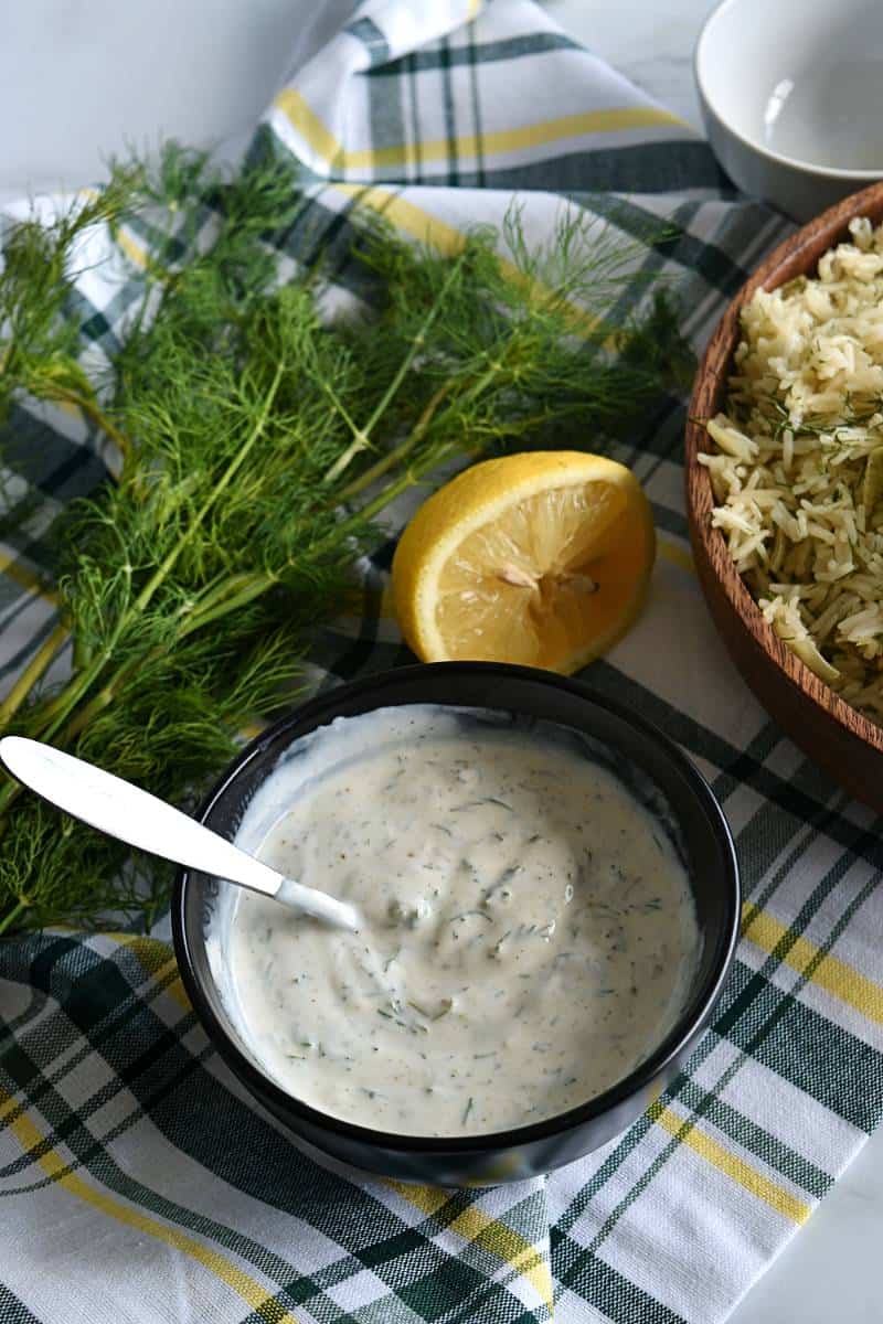 Yogurt dill sauce in a bowl.