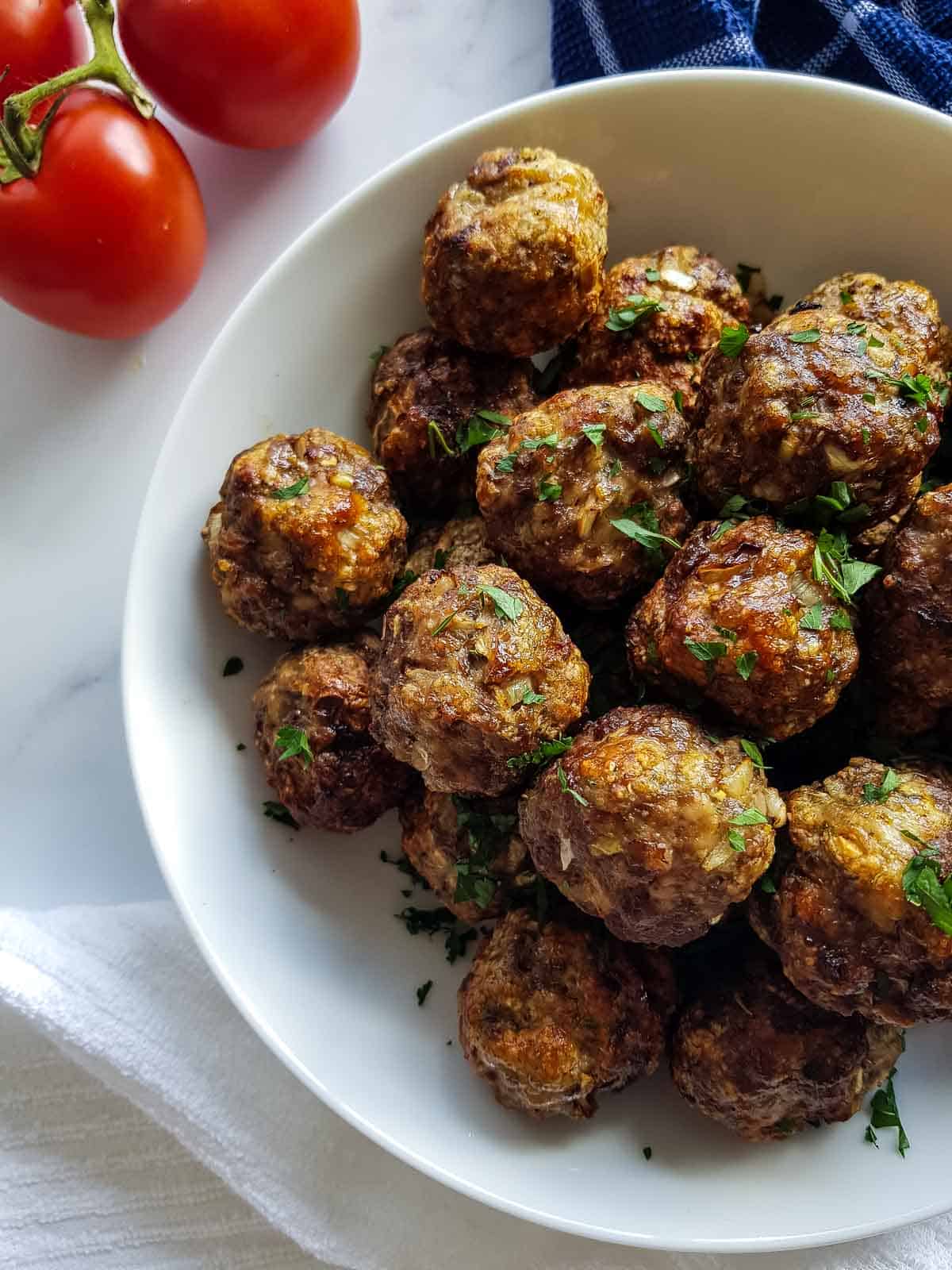 Meatballs with parsley on top.