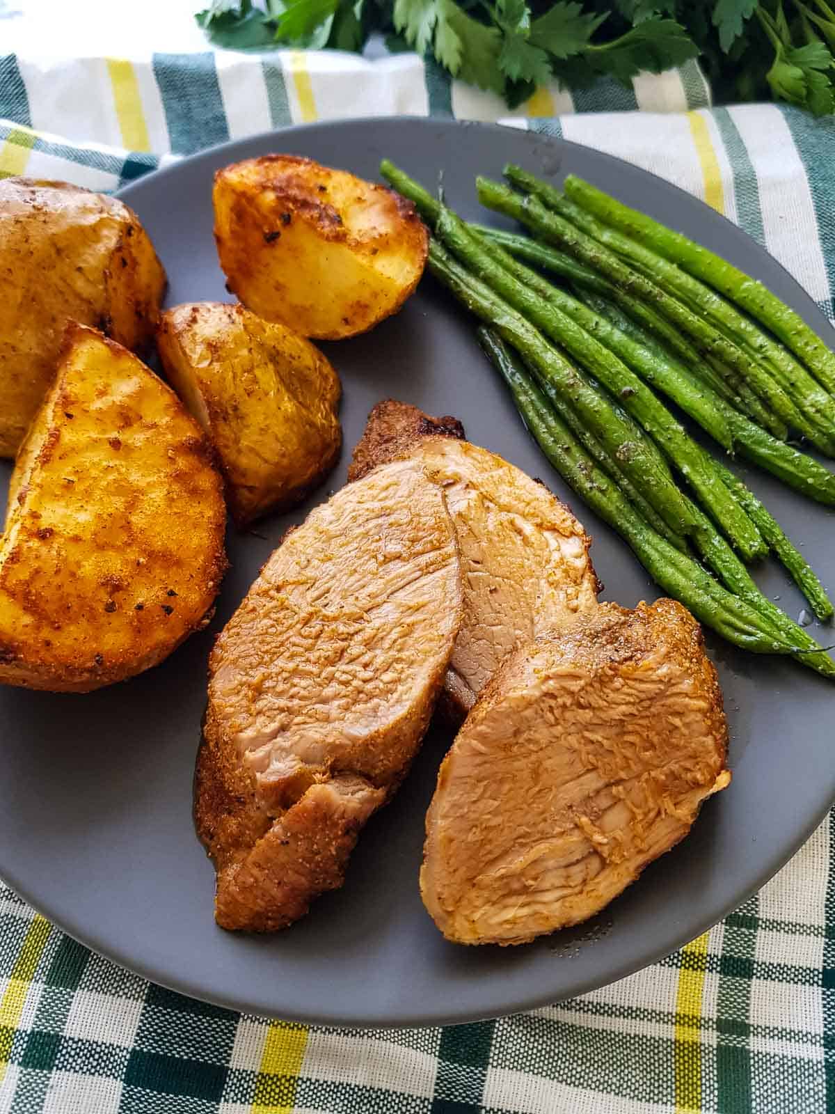 Tenderloin, potatoes and green beans.