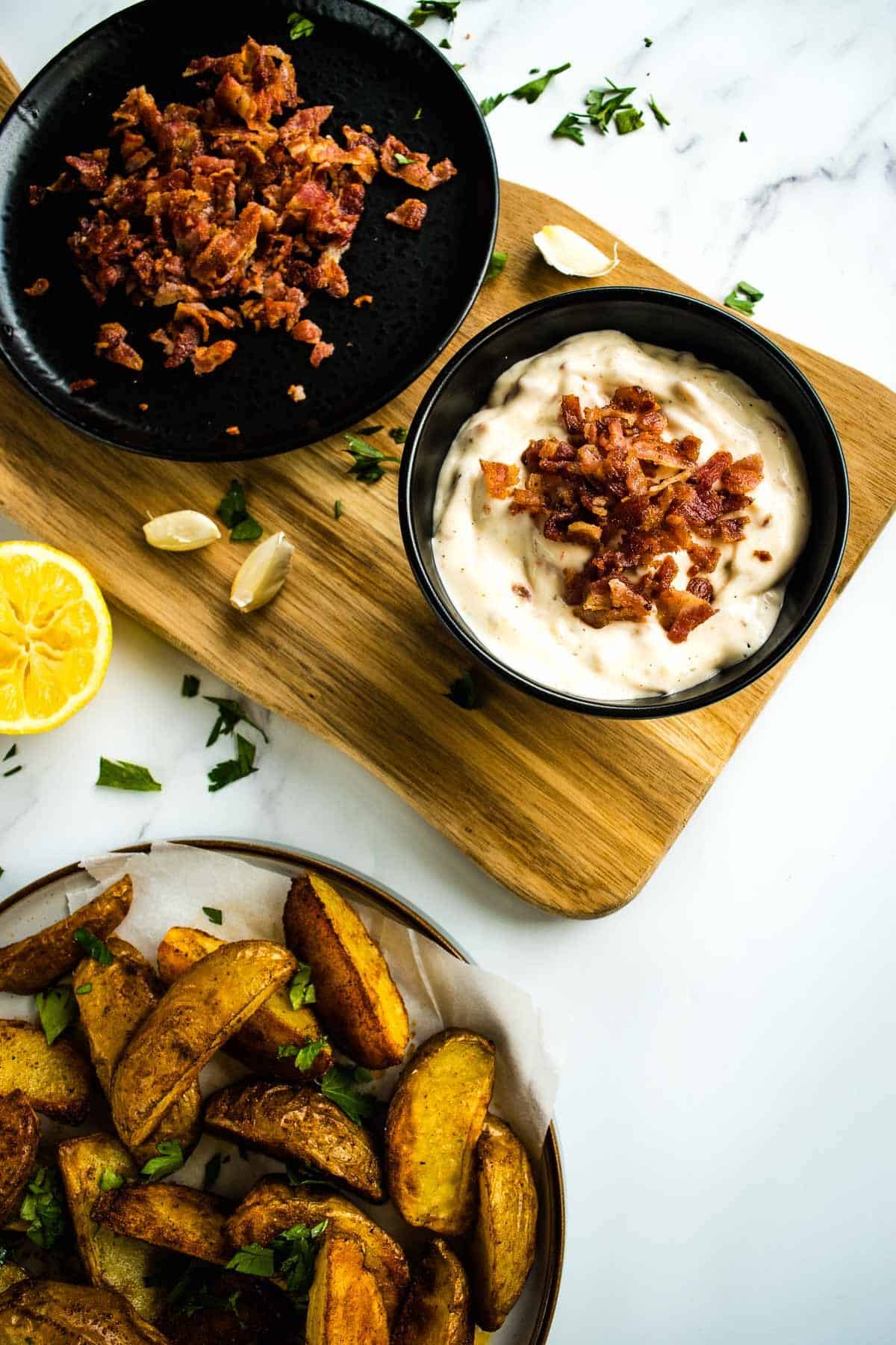 Bacon mayo dip with potato wedges.