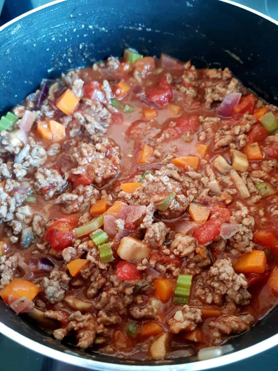 Cooking healthy bolognese.