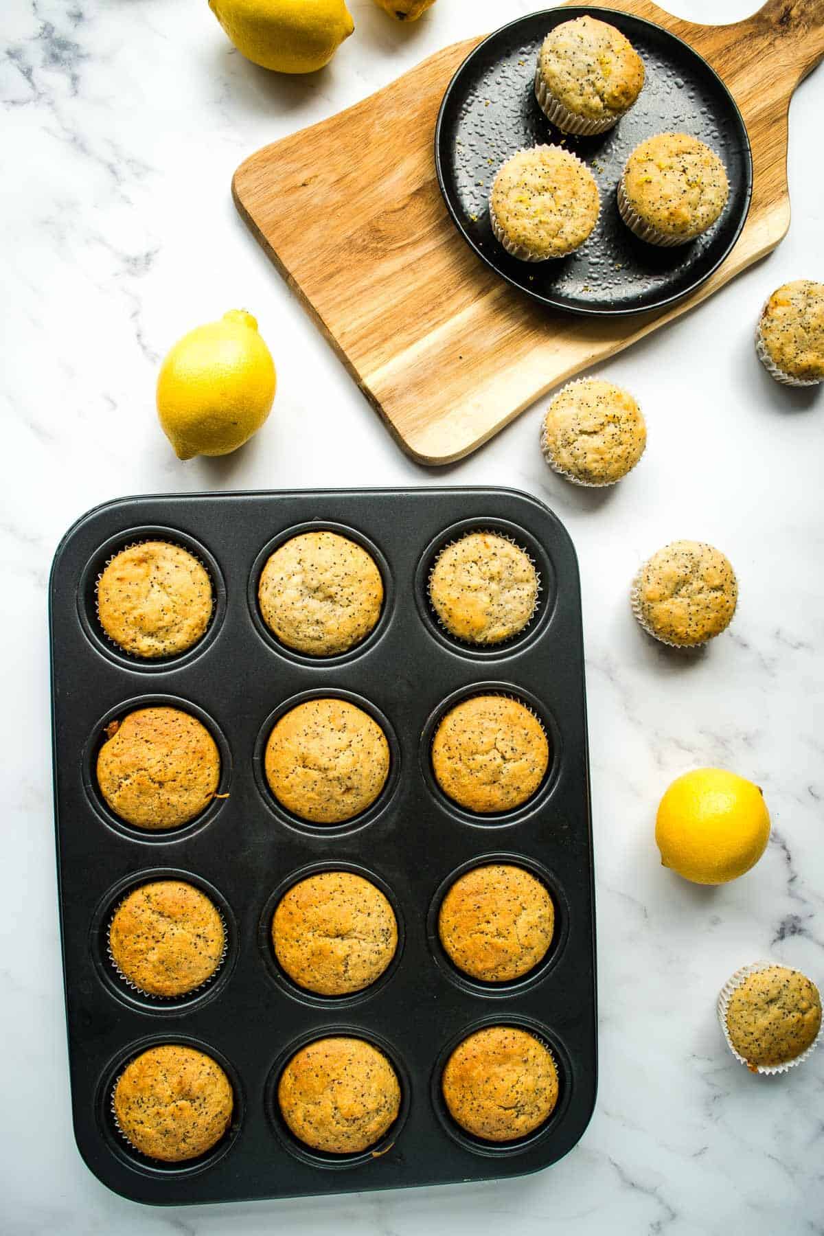 Healthy lemon muffins in a muffin pan.