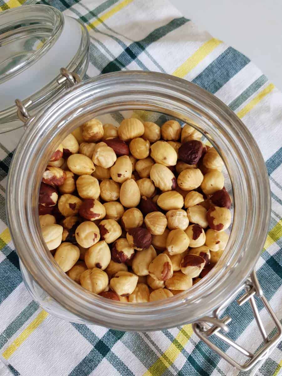 Roasted hazelnuts in a jar.