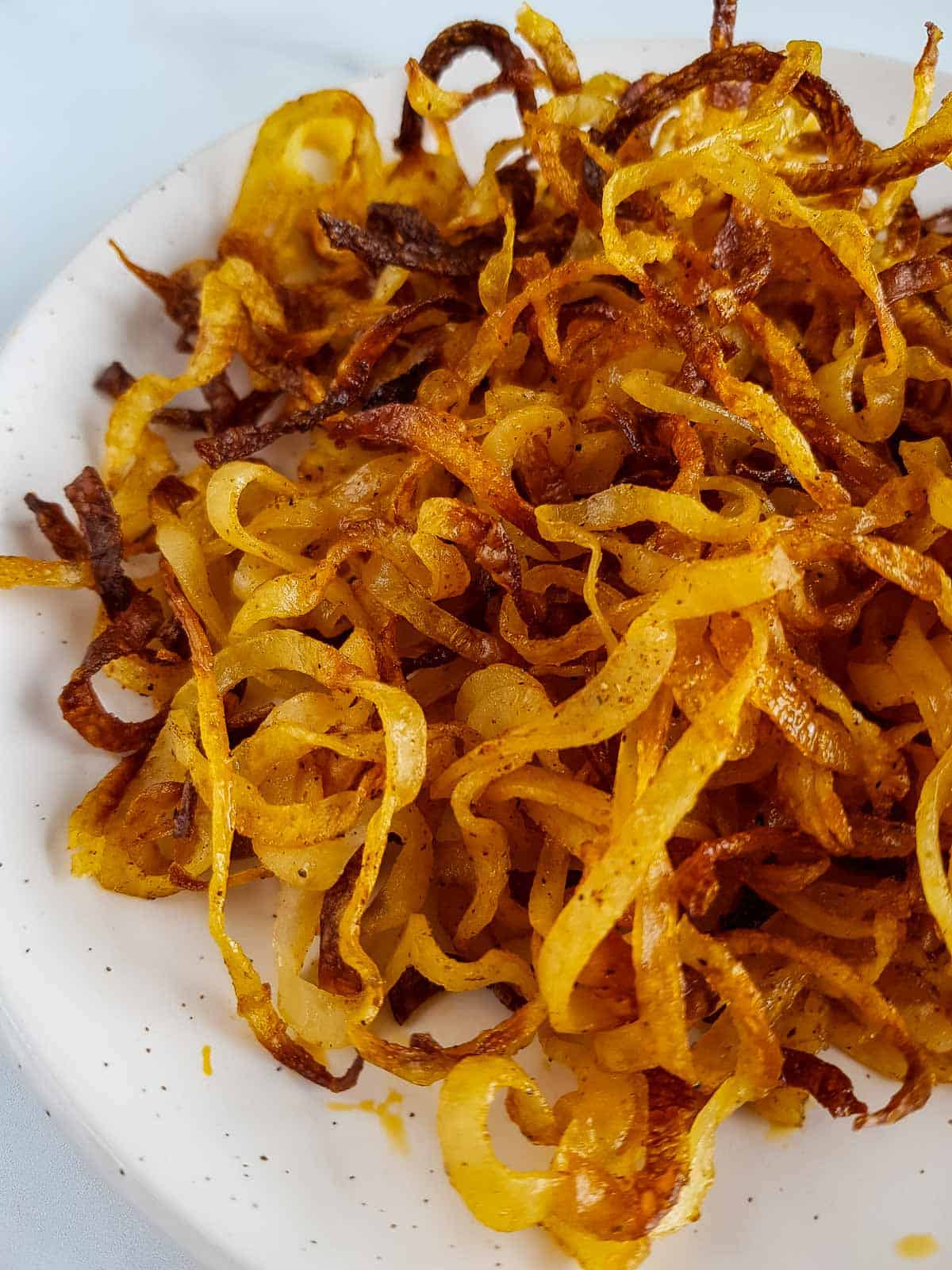 Crispy baked potato strings.