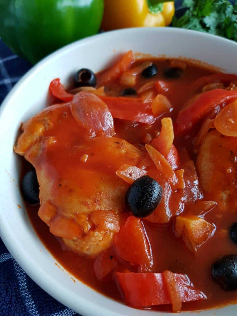 Tomato chicken stew with peppers.