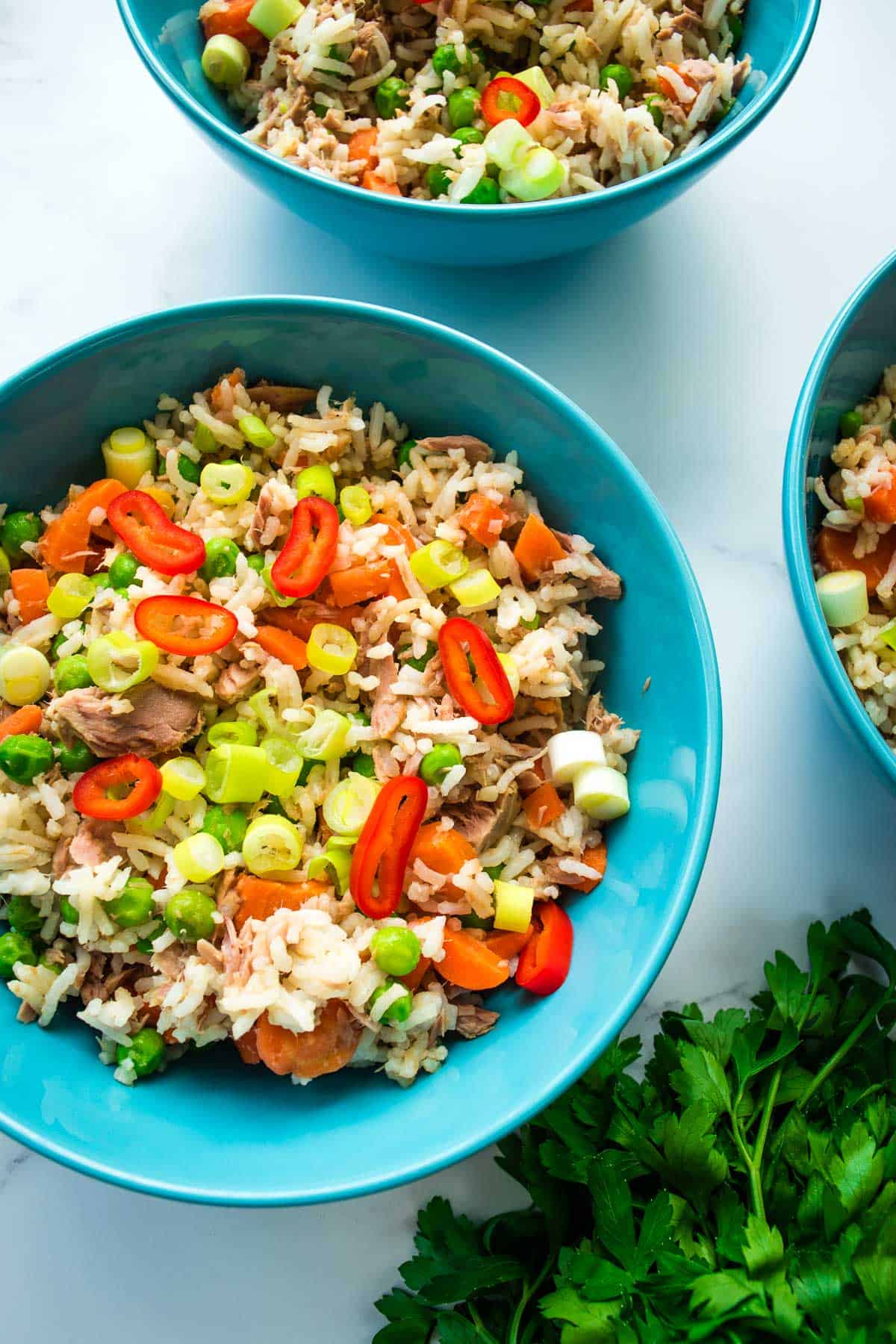 Fried rice in blue bowls.