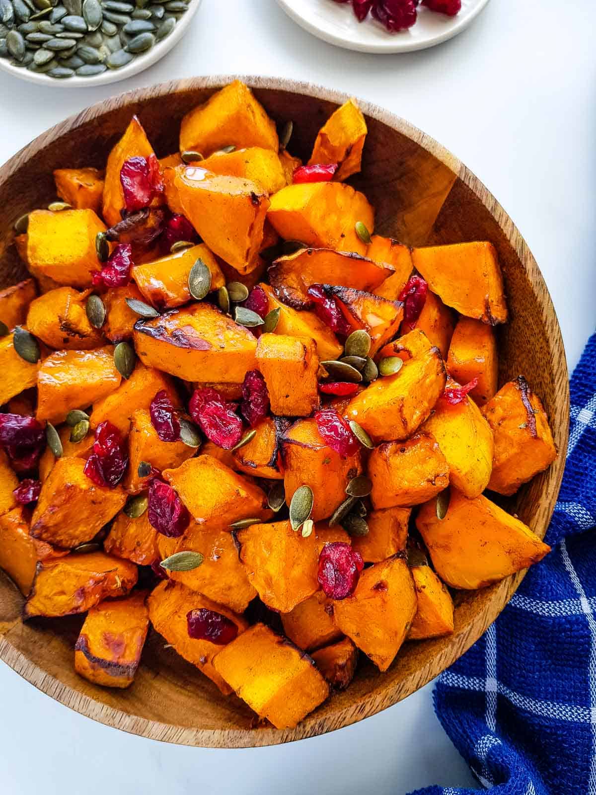 Roasted butternut squash with cranberries and pumpkin seeds.