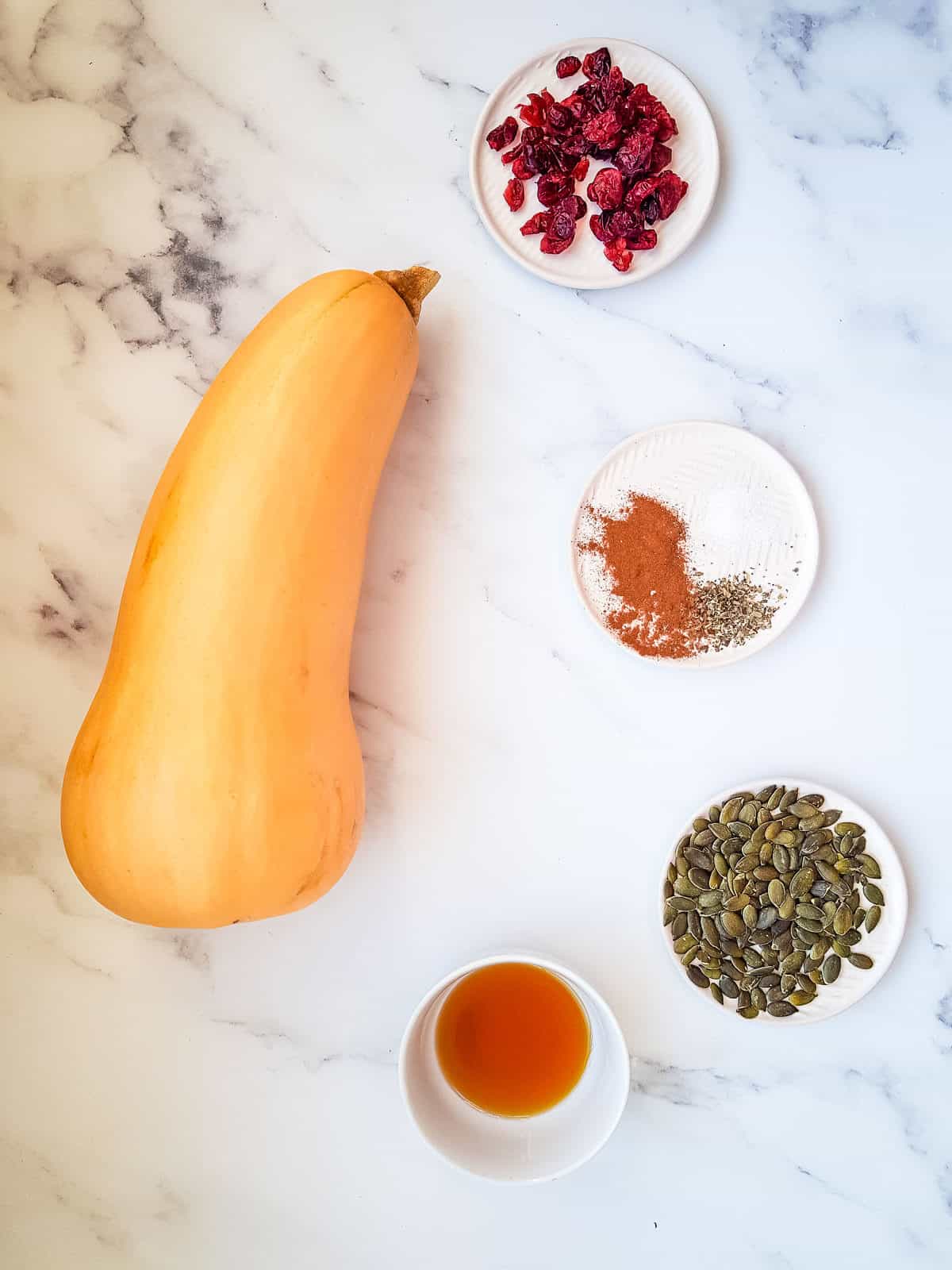 The ingredients for air fryer butternut squash laid out on a table.