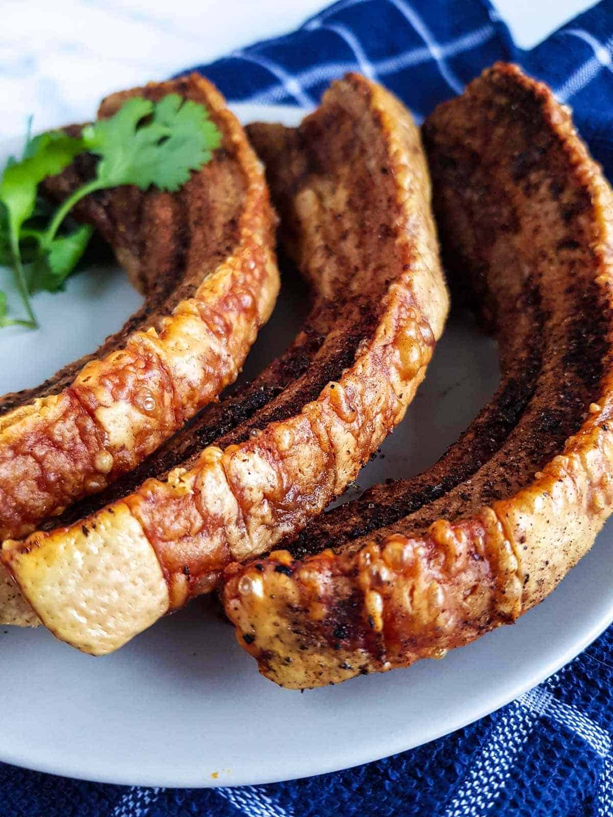 Close up of the crackling on pork belly slices.