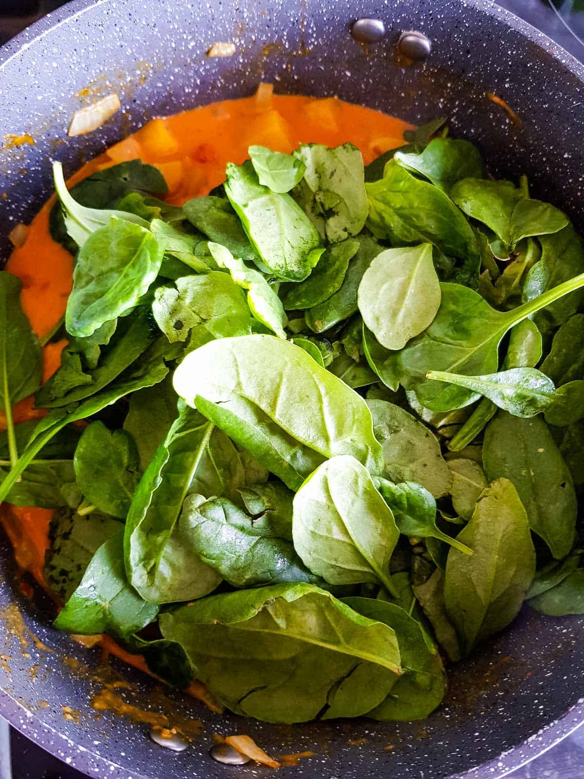 Butternut squash curry with spinach.