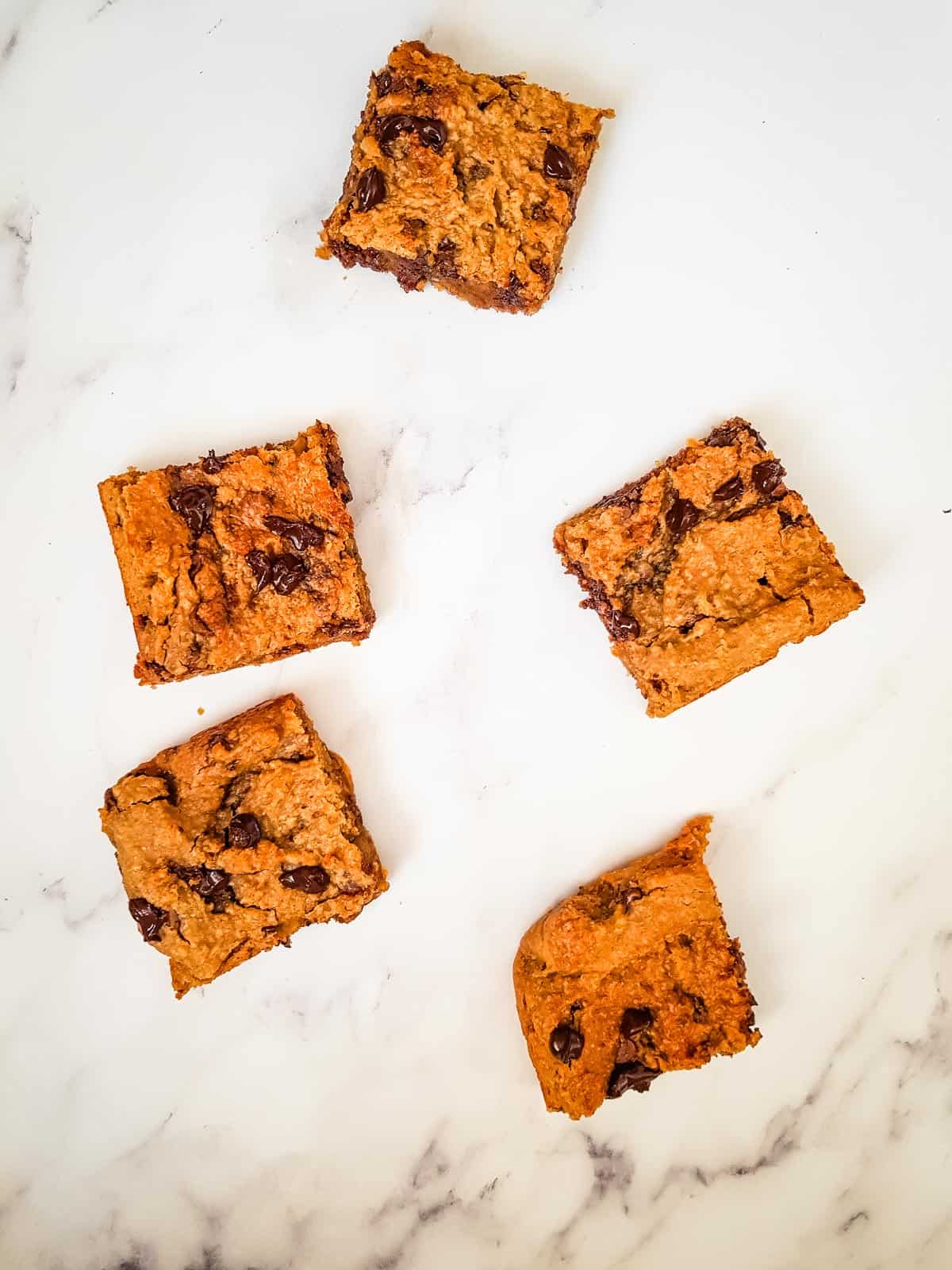 Chickpea blondies laid out on a table.