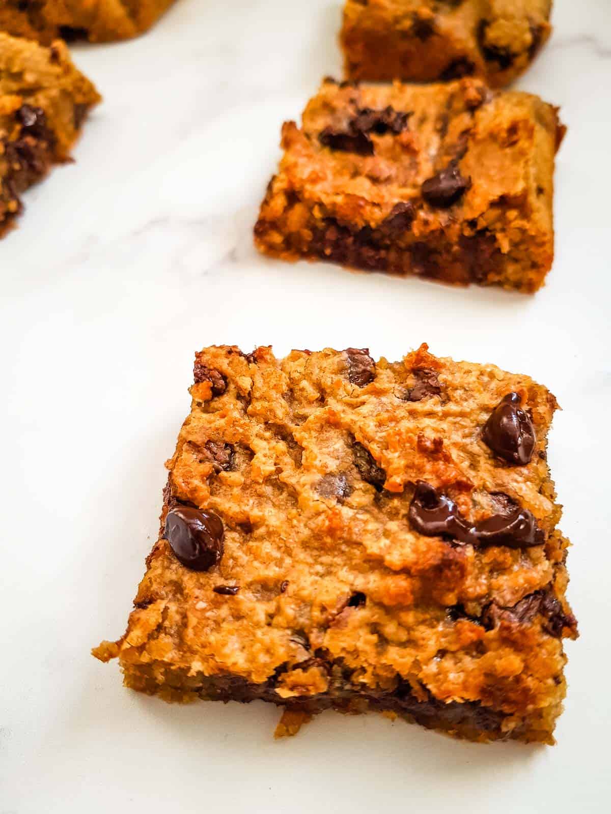 Close up of chickpea blondies with chocolate chips.