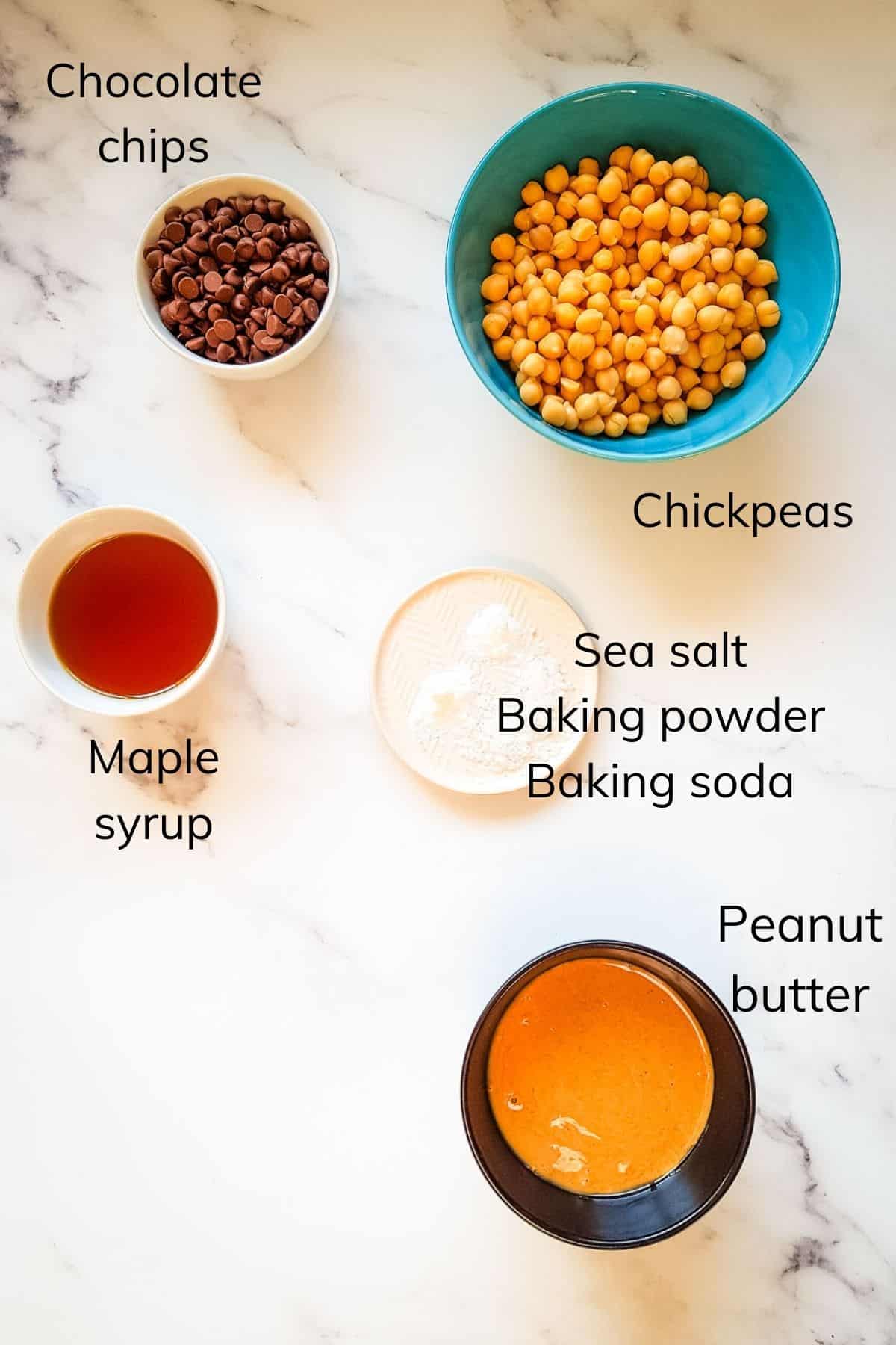 The ingredients required to make chickpea blondies laid out on a table.