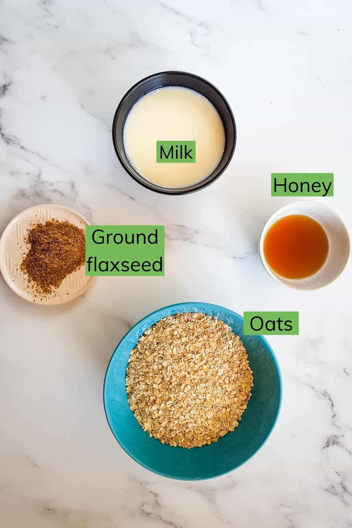 Ingredients for flaxseed oatmeal laid out on a table.