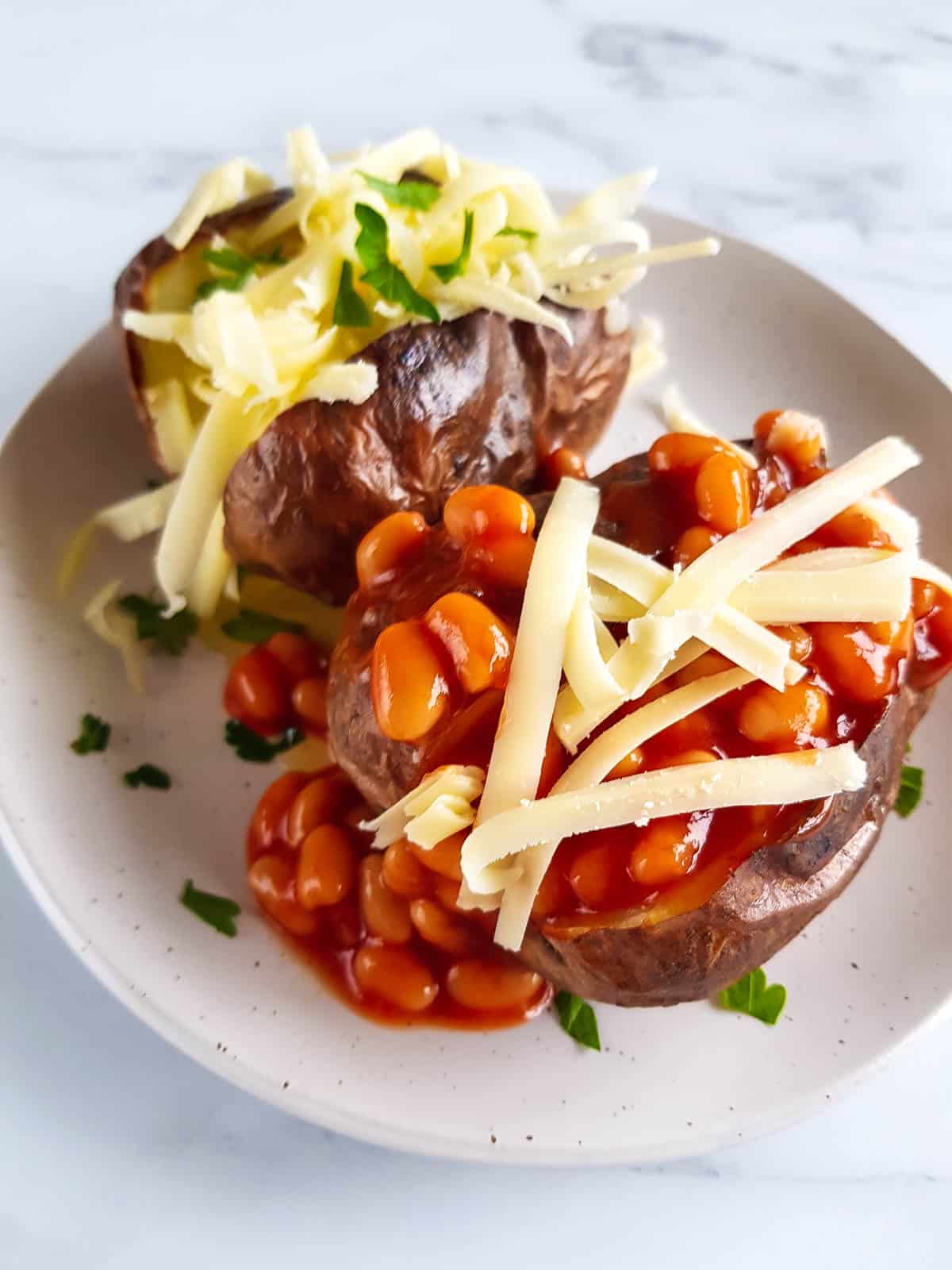 Baked potatoes with beans and cheese.