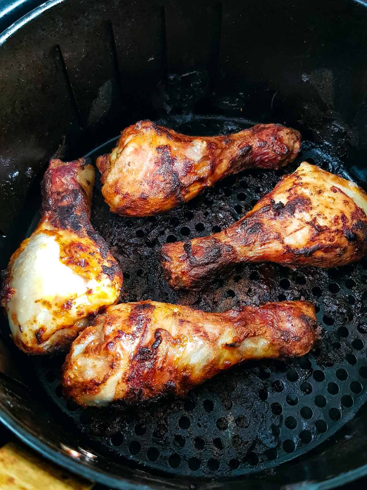 Crispy air fried chicken drumsticks.