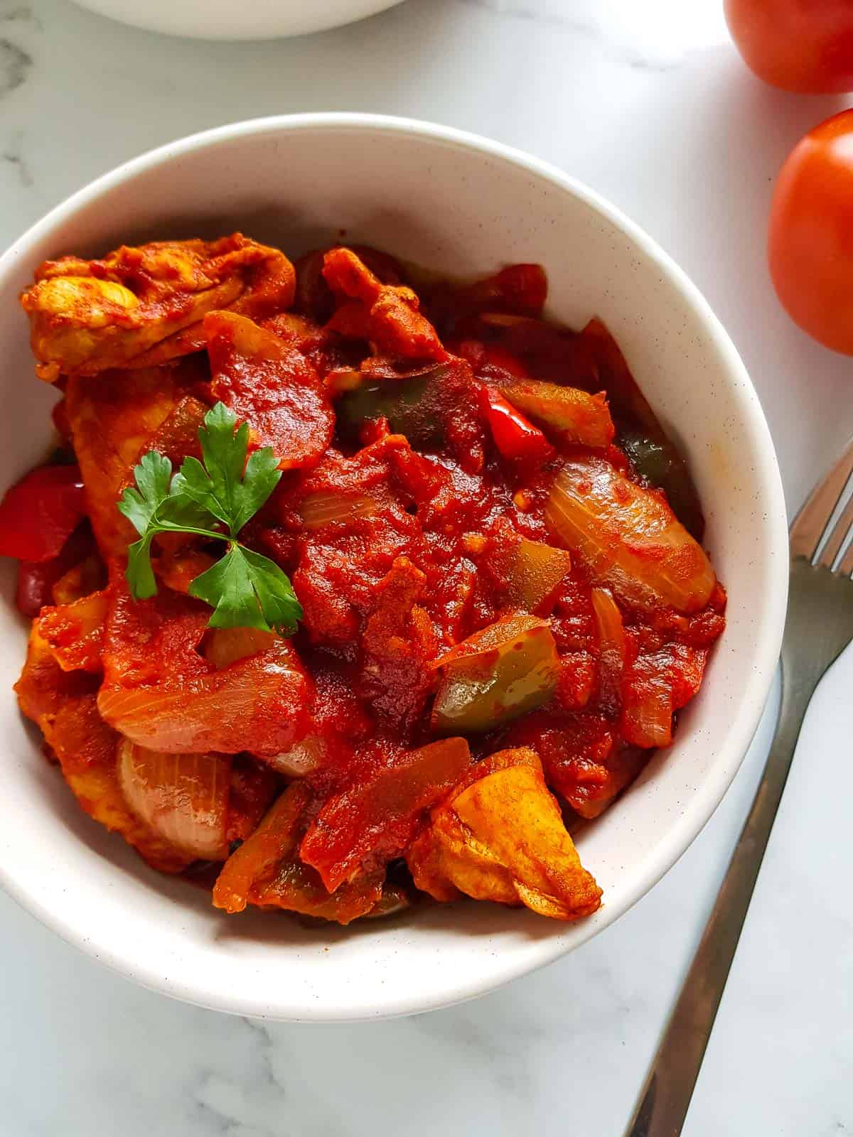 Peppers and chicken in a paprika sauce.