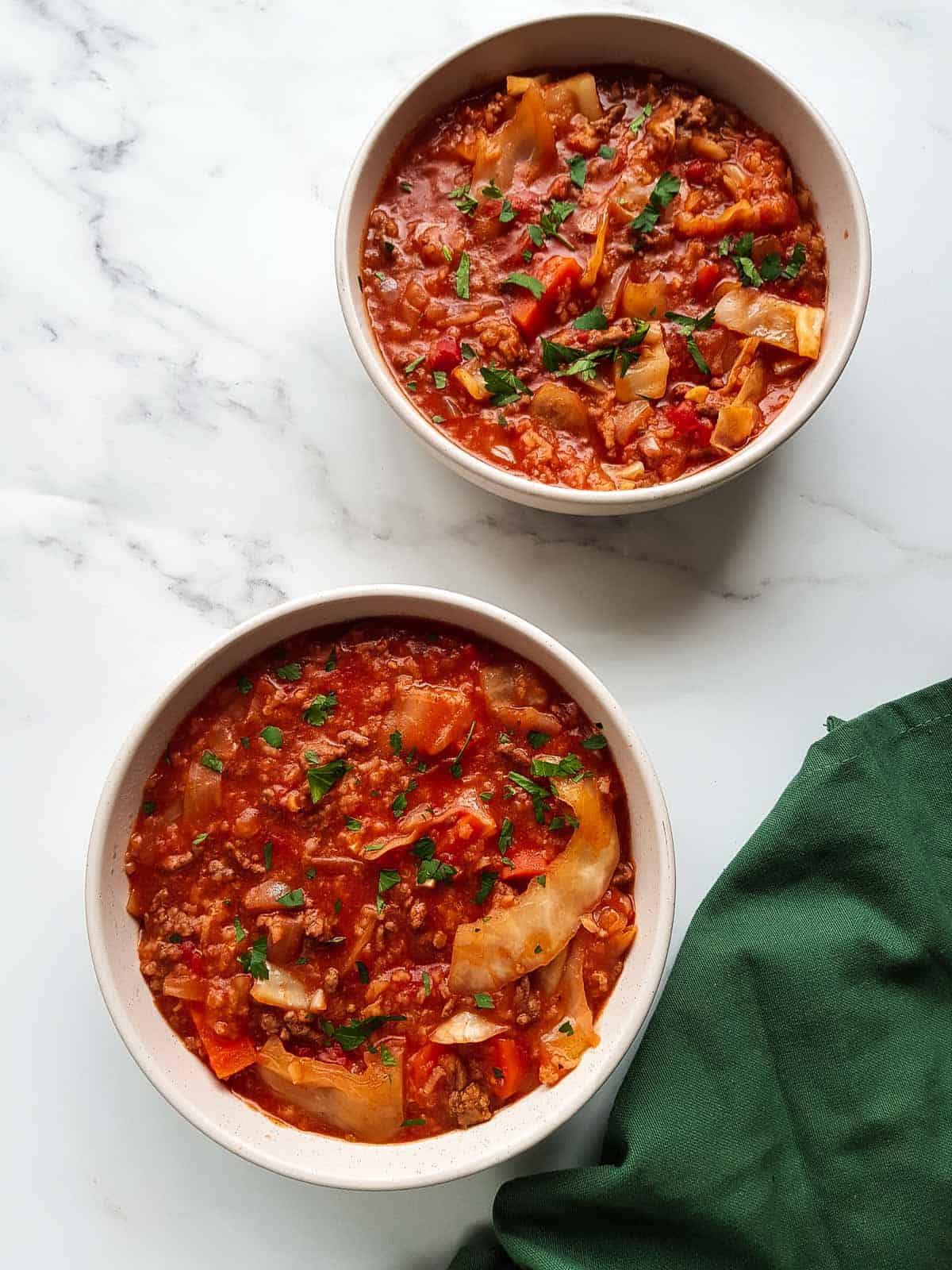 Two bowls of cabbage roll soup.