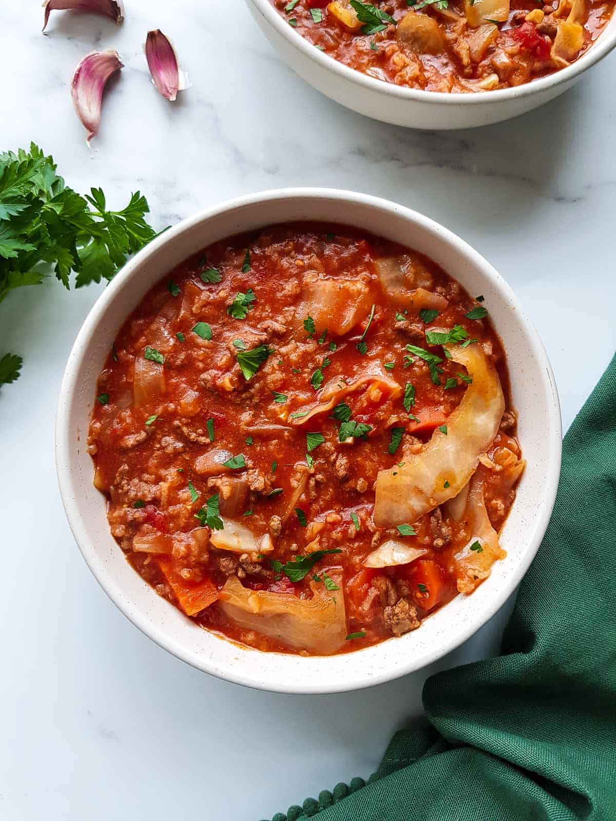 A bowl of crockpot cabbage roll soup.
