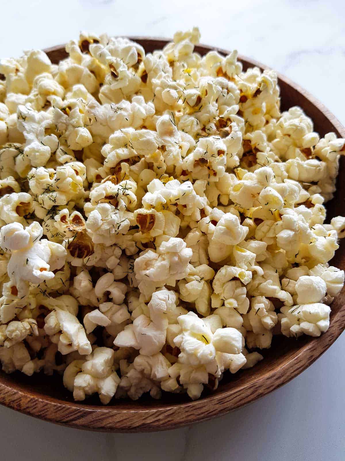 Close up of dill pickle popcorn.