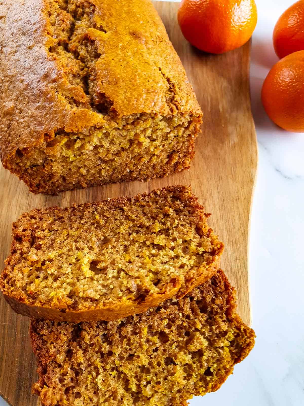 Close up of slices of orange loaf.