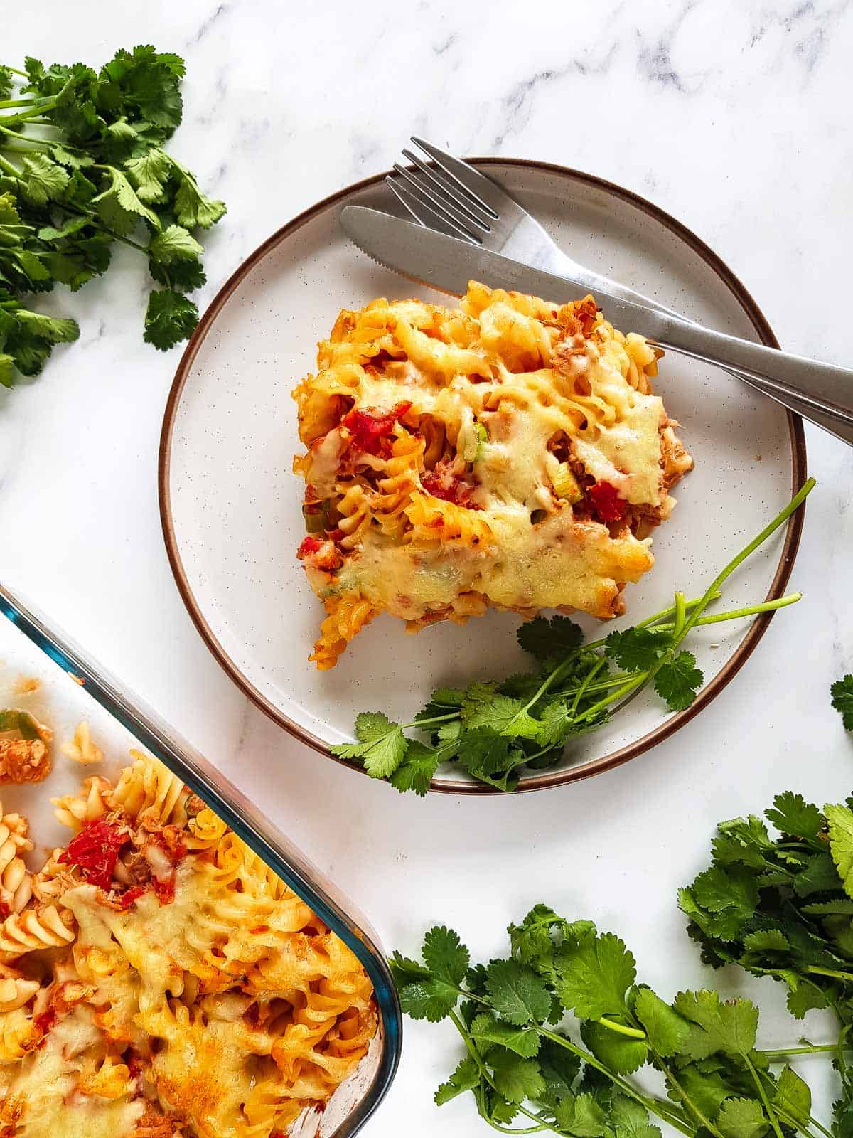 A portion of pasta bake on a plate.