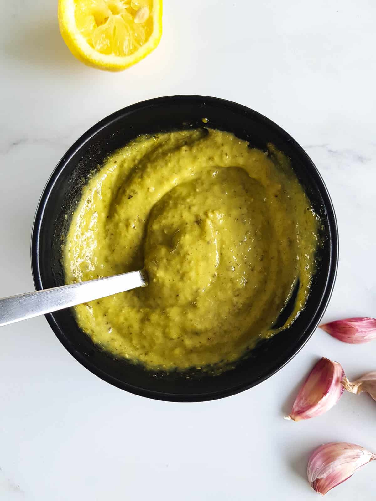 Pesto aioli in a bowl.