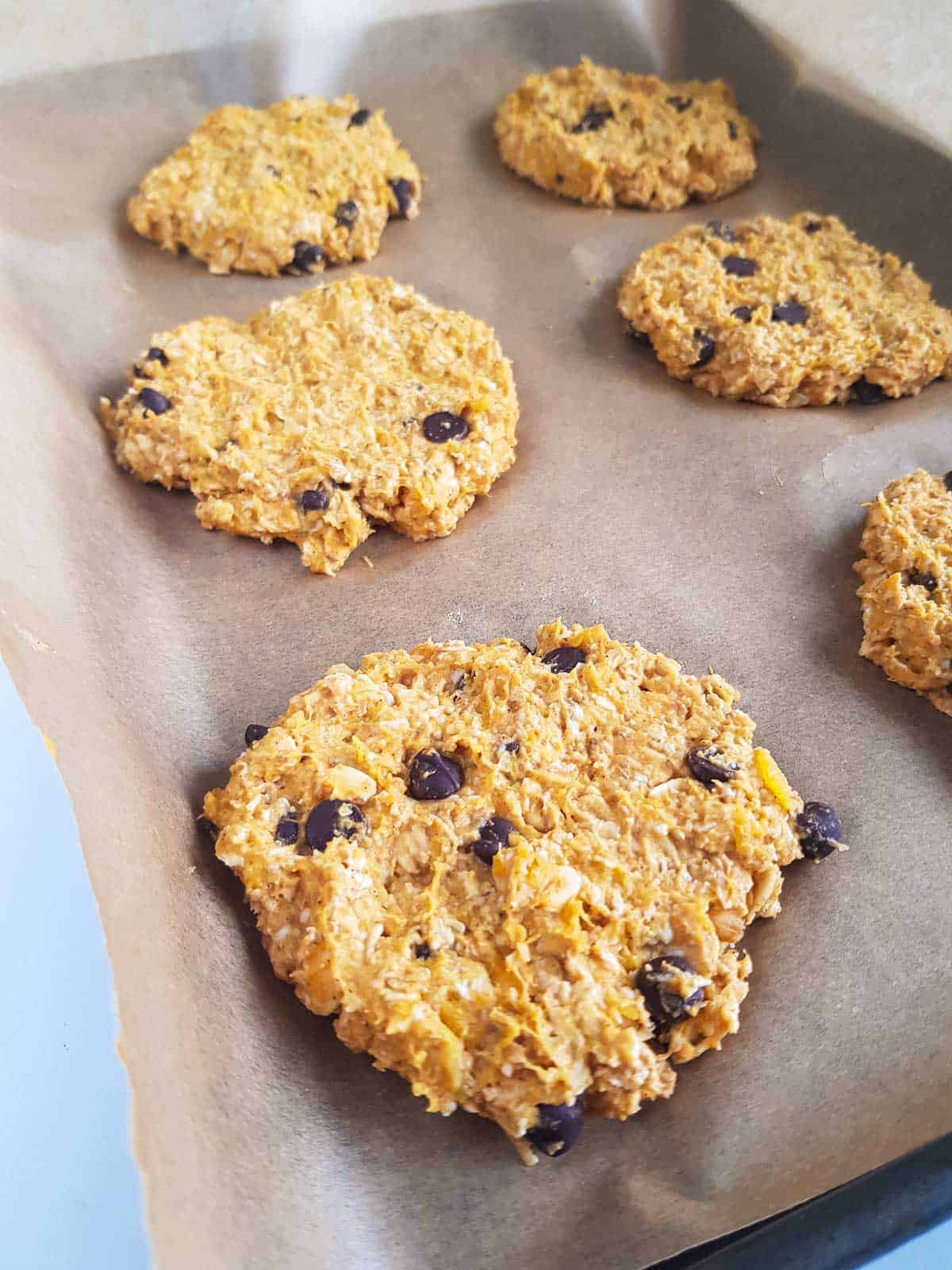 Uncooked cookies on a baking pan.