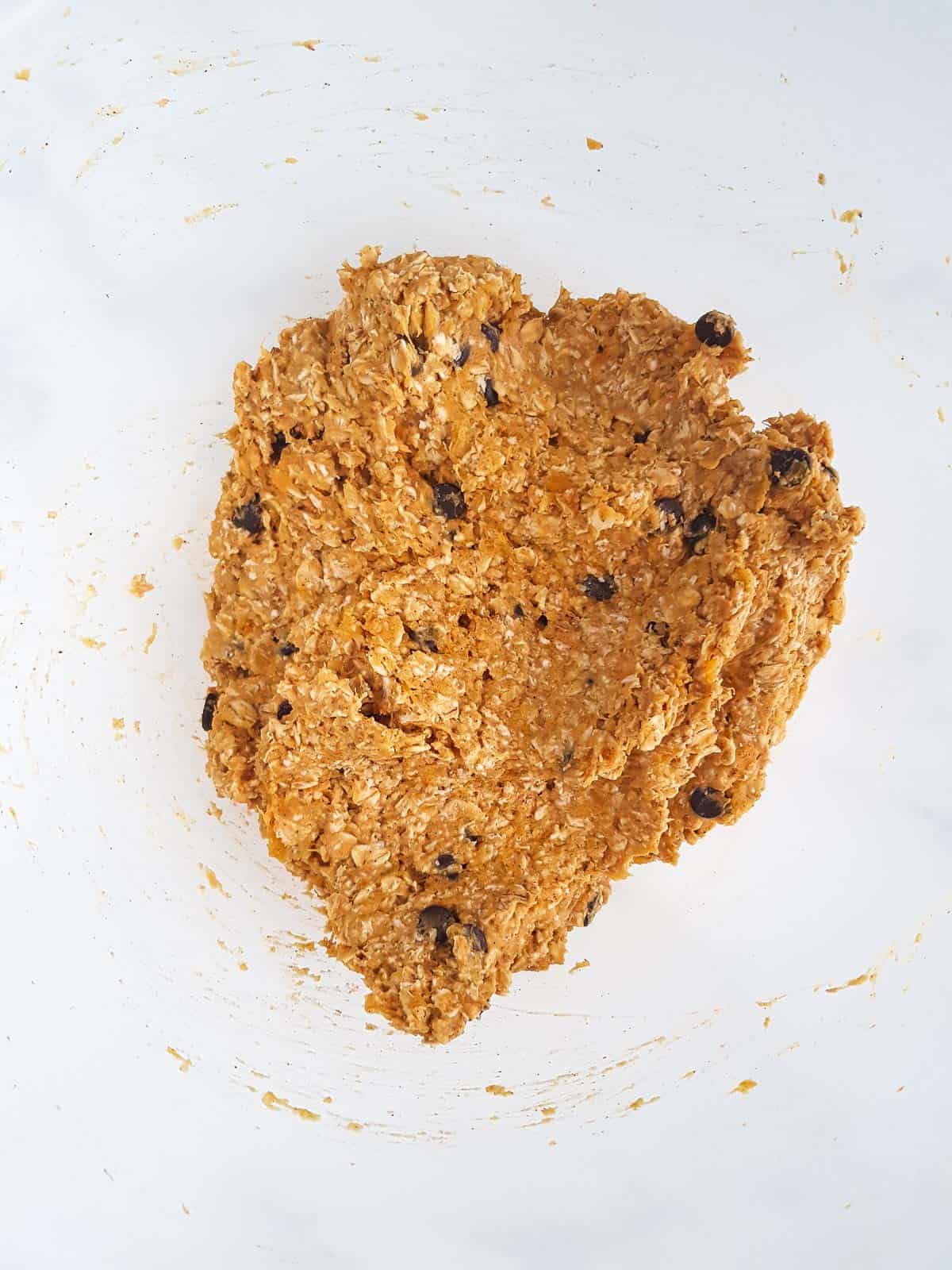 Pumpkin cookie dough in a bowl.