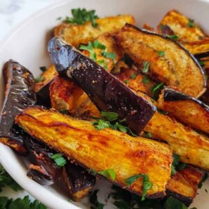 Close up picture of air fried eggplant fries.