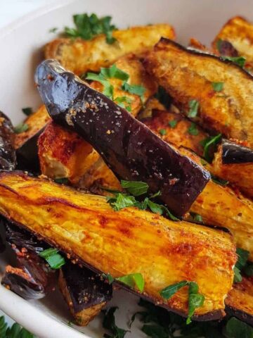 Close up picture of air fried eggplant fries.