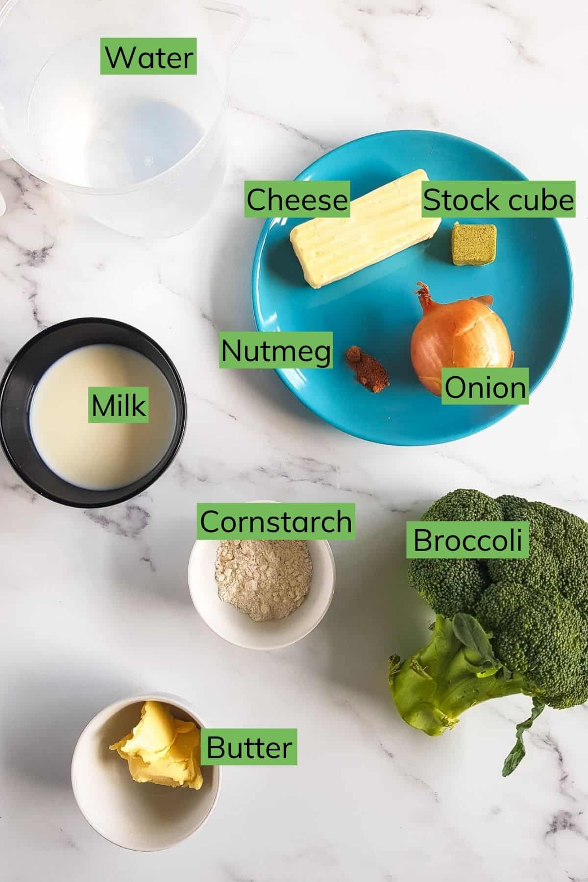 The ingredients for broccoli cheese soup laid out on a table.