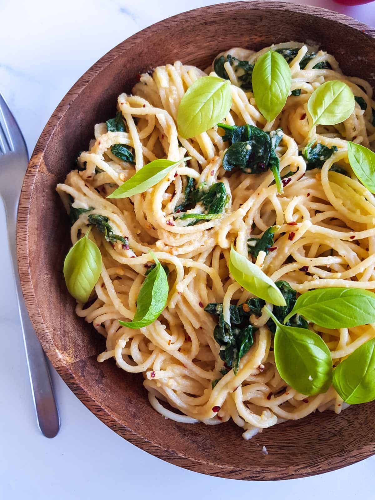 A close up of hummus pasta.