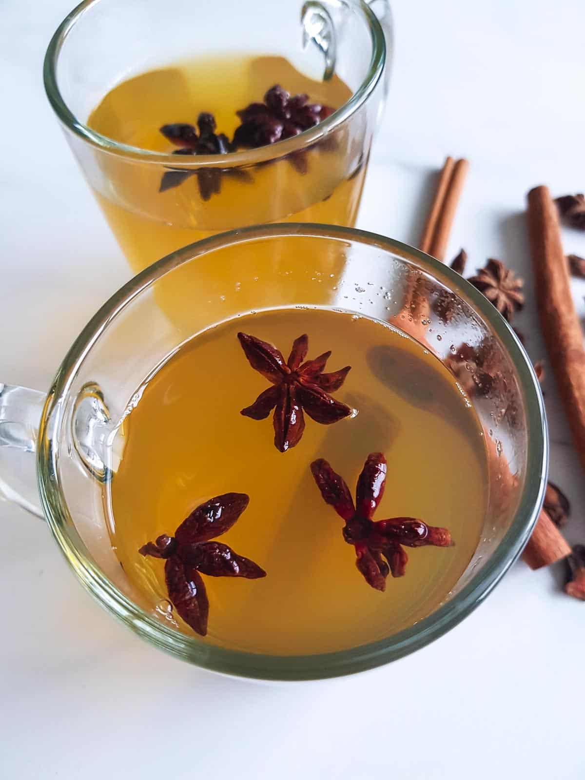 Close up of a cup of tea with star anise.