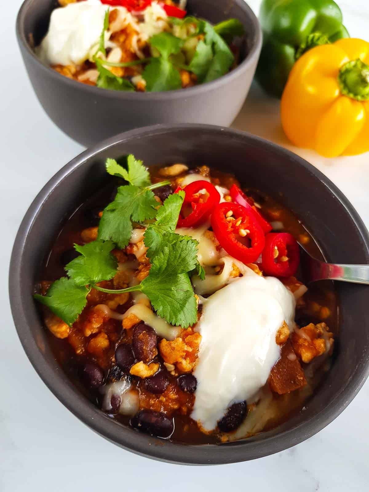 Close up of a bowl of turkey sweet potato chili.