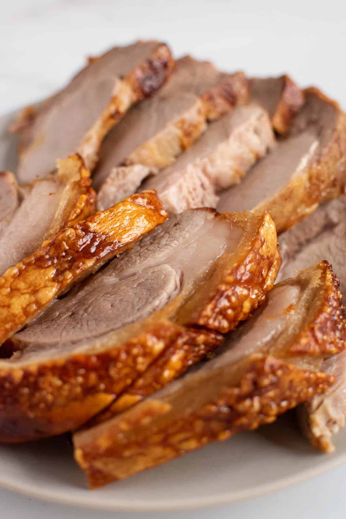 Close up image of pork roast with crackling.